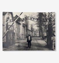 Load image into Gallery viewer, Photograph of Allen Ginsberg at the gates of Auschwitz