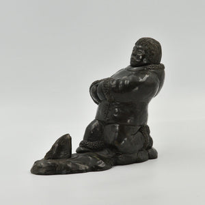 depicting an Inuit fishing