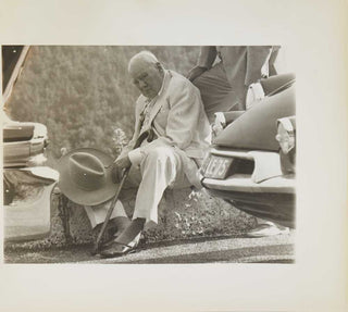 Photograh of Winston Churchill seated outside at the Col du Castillon