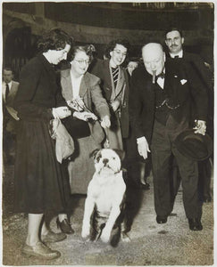 Photograph of Winston Churchill, members of British Embassy staff, and pet …