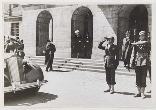 Photograph of Winston Churchill approaching a car