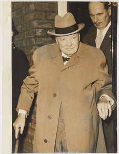 Photograph of Winston Churchill in tan jacket and hat