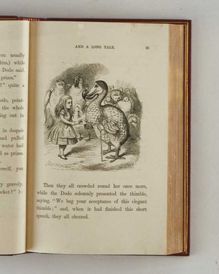 CARROLL, Lewis (pseudonym for: Charles DODGSON); John TENNIEL (illustrator). Alice’s Adventures in Wonderland. With Forty-Two Illustrations. [[bmid:2126643e]]