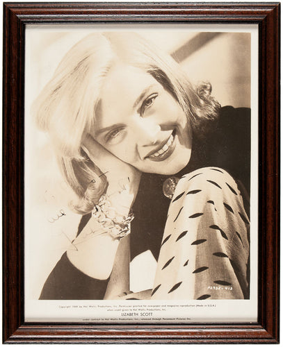 Black and white photograph signed
